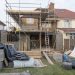 Block walls and reinforcement on a bungalow under construction, illustrating the cost of building a 3-bedroom bungalow in Nigeria in 2026