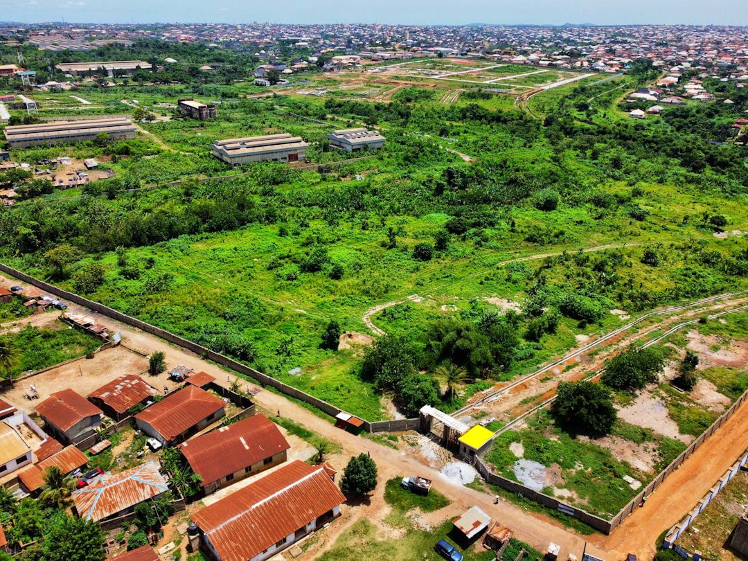 Aerial view of a Nigerian estate development with plots and access roads