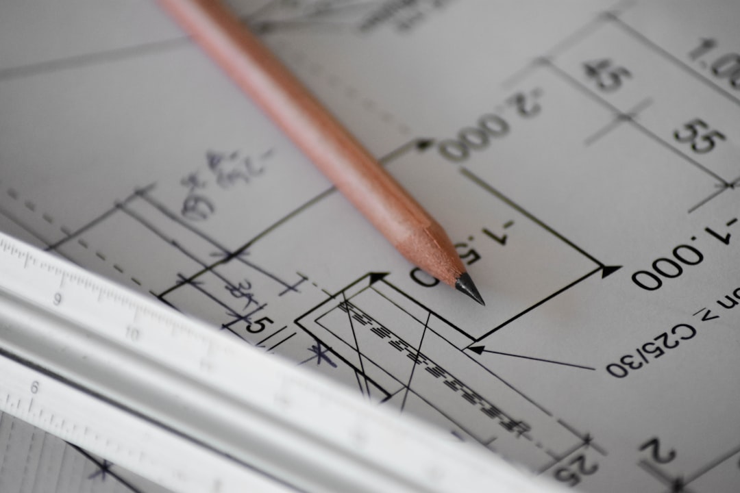 Property documents and survey plan being reviewed before purchase