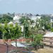 Aerial view of houses in a Nigerian city, illustrating the country's 22-28 million housing deficit