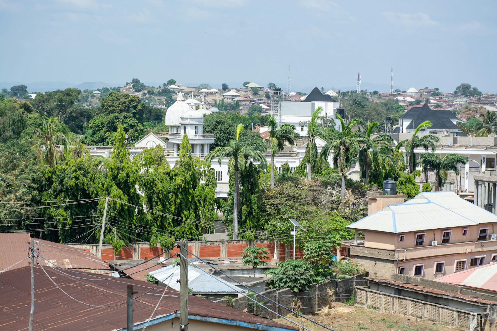 Aerial view of houses in a Nigerian city, illustrating the country's 22-28 million housing deficit