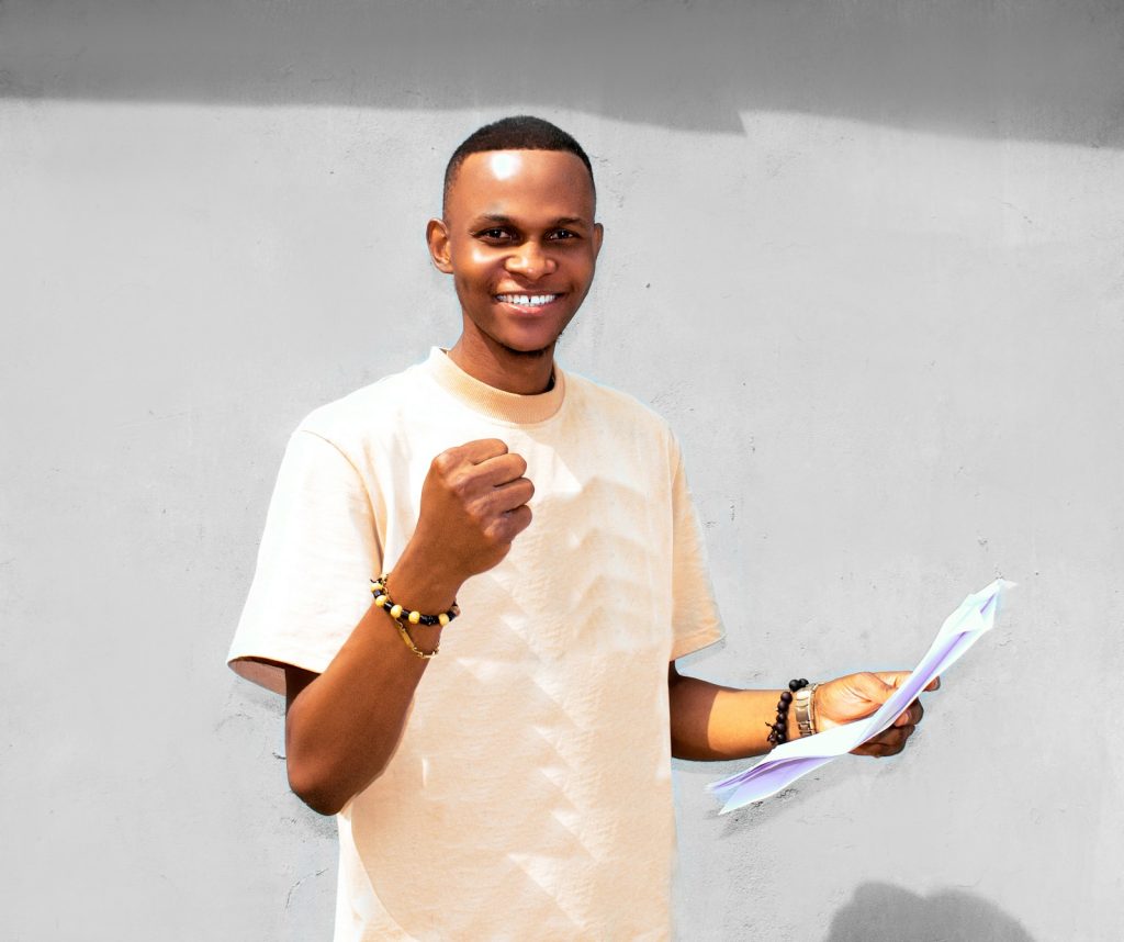 A man reviewing property paperwork before a deal, illustrating how to verify a LASRERA-registered estate agent in Lagos in 2026