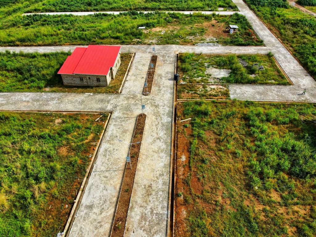 New bungalow under construction with concrete block walls at a residential estate in Ibadan, Nigeria