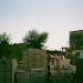Stack of grey sandcrete blocks at a Nigerian building site for a 3-bedroom bungalow