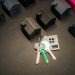 A house key and model home representing FMBN's 2026 diaspora NHF mortgage for Nigerians abroad