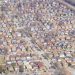Aerial view of tightly packed houses, illustrating Nigeria's new building-level digital postcode system arriving in 2026