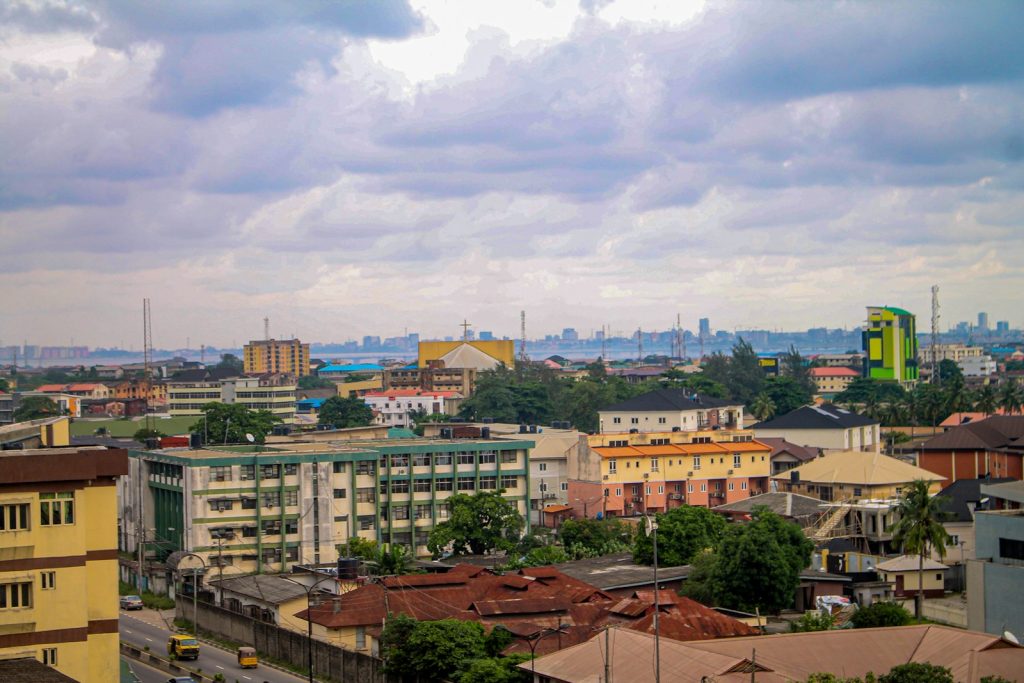High-rise apartment buildings on a Nigerian city skyline, illustrating rental-yield markets in 2026