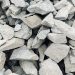 Heap of crushed granite aggregate on a Nigerian building site, used for concrete when building a house